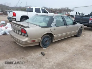 1996 Oldsmobile Cutlass Supreme S z VIN 1G3WH52M9TF377685, wystawiony jako IAAI lot #41496775 z przebiegiem 197 366 mil mil oraz . Historia ofert i sprzedaży dostępna na DreamBid. Obrazek 4.