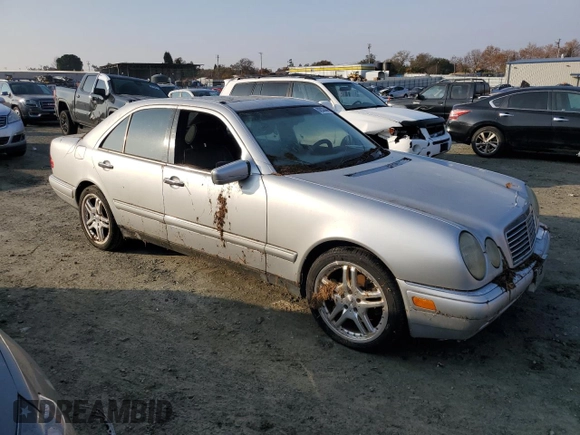 1997 Mercedes-Benz E-Class with VIN WDBJF72F6VA523987, listed as a Copart auction lot 82932444 with 216,038 mi miles and Clean Title. Bid and sale history available at carsss.com. Image 4.