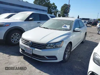 2016 Volkswagen Passat S with VIN 1VWAT7A3XGC036460, listed as a IAAI auction lot 42466059 with 91,672 mi miles and . Bid and sale history available at DreamBid. Image 2.