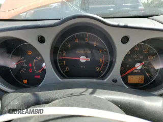 2007 Nissan 350Z Enthusiast z VIN JN1BZ34D37M506022, wystawiony jako Copart lot #52043755 z przebiegiem 147 099 mil mil oraz Szkody całkowita. Historia ofert i sprzedaży dostępna na DreamBid. Obrazek 9.