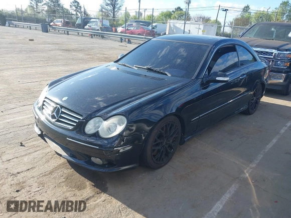 2004 Mercedes-Benz CLK-Class 5.0L with VIN WDBTJ75J14F095156, listed as a IAAI auction lot 41815605 with 176,902 mi miles. Bid and sale history available at carsss.com. Image 2.