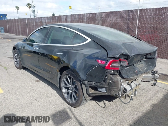 2019 Tesla Model 3 Mid Range z VIN 5YJ3E1EA4KF361967, wystawiony jako IAAI lot #42261724 z przebiegiem 89 902 mil mil oraz . Historia ofert i sprzedaży dostępna na DreamBid. Obrazek 3.