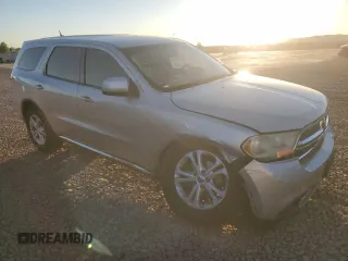 2013 Dodge Durango SXT with VIN 1C4RDHAG7DC643620, listed as a Copart auction lot 57677545 with 126,536 mi miles and Salvage title. Bid and sale history available at DreamBid. Image 4.