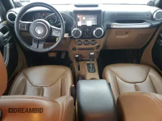 2014 Jeep Wrangler Unlimited Sahara with VIN 1C4HJWEG7EL299548, listed as a Copart auction lot 58522355 with 76,057 mi miles and Clean title. Bid and sale history available at DreamBid. Image 8.
