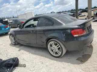 2012 BMW 1 Series 135i with VIN WBAUC9C5XCVM12807, listed as a Copart auction lot 61680225 with 117,314 mi miles and Salvage title. Bid and sale history available at DreamBid. Image 2.