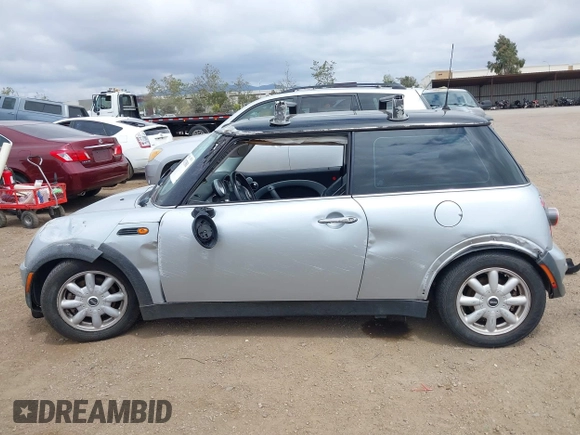 2004 MINI Hardtop with VIN WMWRC33434TJ57506, listed as a IAAI auction lot 42117581 with 148,483 mi miles and . Bid and sale history available at DreamBid. Image 14.