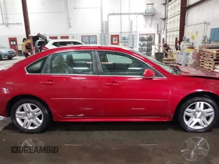 2013 Chevrolet Impala LT with VIN 2G1WG5E30D1258088, listed as a IAAI auction lot 42088699 with 145,416 mi miles and . Bid and sale history available at DreamBid. Image 13.