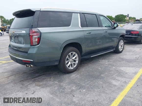 2023 Chevrolet Suburban Premier with VIN 1GNSCFKD2PR377493, listed as a IAAI auction lot 42426988 with 71,365 mi miles and . Bid and sale history available at DreamBid. Image 4.