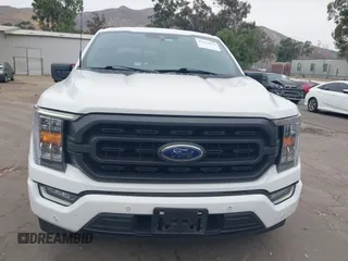 2021 Ford F-150 XL with VIN 1FTEW1CP7MKE89476, listed as a IAAI auction lot 42299954 with 152,473 mi miles and . Bid and sale history available at DreamBid. Image 12.