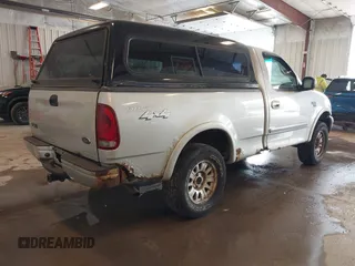 2001 Ford F-150 XL with VIN 2FTRF18W31CB06246, listed as a IAAI auction lot 42307983 with 148,440 mi miles and . Bid and sale history available at DreamBid. Image 4.