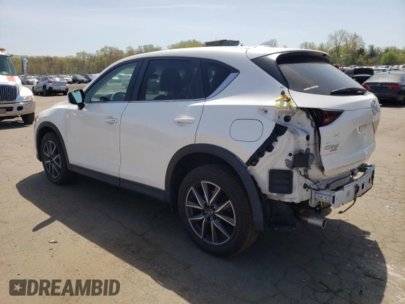 2018 Mazda CX-5 Touring with VIN JM3KFBCMXJ0389773, listed as a Copart auction lot 54737795 with 82,103 mi miles and Salvage Title. Bid and sale history available at DreamBid. Image 2.