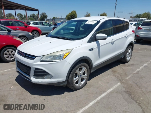 2014 Ford Escape SE with VIN 1FMCU9G98EUA39702, listed as a IAAI auction lot 42683914 with 276,162 mi miles and . Bid and sale history available at DreamBid. Image 2.