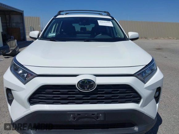 2019 Toyota RAV4 XLE with VIN JTMW1RFV9KD003246, listed as a IAAI auction lot 42115291 with 81,910 mi miles. Bid and sale history available at carsss.com. Image 13.