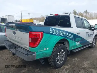 2021 Ford F-150 XL with VIN 1FTEW1EPXMFC83574, listed as a IAAI auction lot 41694174 with 57,814 mi miles. Bid and sale history available at carsss.com. Image 4.