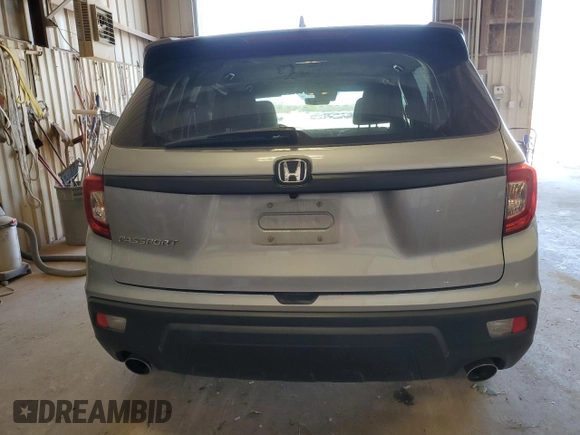 2021 Honda Passport EX-L with VIN 5FNYF7H54MB008281, listed as a Copart auction lot 50746845 with 77,559 mi miles and Salvage Title. Bid and sale history available at DreamBid. Image 6.