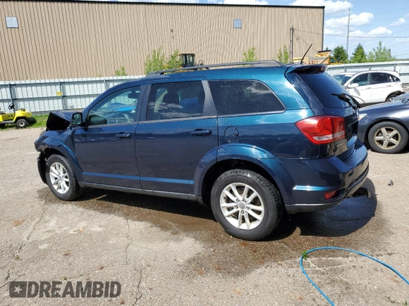2013 Dodge Journey SXT with VIN 3C4PDCCG1DT637534, listed as a Copart auction lot 56992205 with 128,531 mi miles and Clean title. Bid and sale history available at DreamBid. Image 2.
