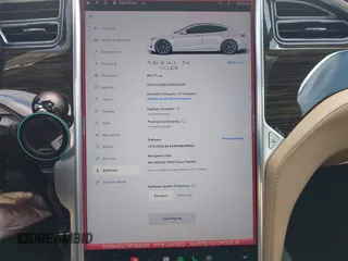 2016 Tesla Model S 90D with VIN 5YJSA1E27GF153525, listed as a IAAI auction lot 41539221 with 145,771 mi miles and . Bid and sale history available at DreamBid. Image 7.