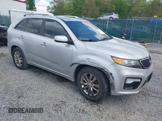 2011 Kia Sorento SX with VIN 5XYKWDA25BG098907, listed as a IAAI auction lot 42191554 with 171,585 mi miles and . Bid and sale history available at DreamBid. Image 1.