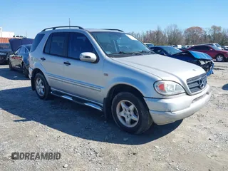 2001 Mercedes-Benz M-Class with VIN 4JGAB54E31A254214, listed as a IAAI auction lot 41766708 with 152,011 mi miles. Bid and sale history available at carsss.com. Image 1.