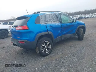 2018 Jeep Cherokee Trailhawk with VIN 1C4PJMBX2JD570976, listed as a IAAI auction lot 41610469 with 151,255 mi miles. Bid and sale history available at carsss.com. Image 4.