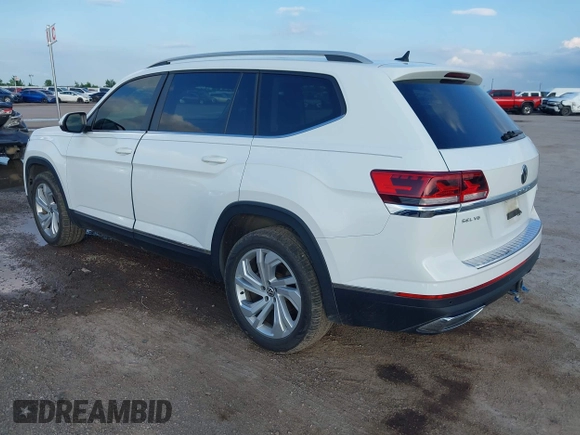 2021 Volkswagen Atlas SEL with VIN 1V2BR2CAXMC522670, listed as a IAAI auction lot 42110724 with 58,802 mi miles and . Bid and sale history available at DreamBid. Image 3.