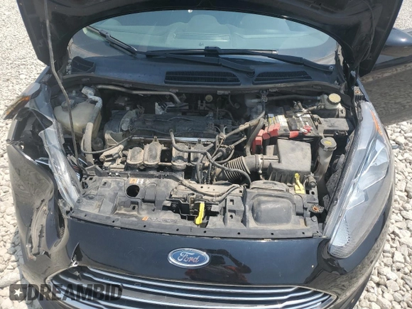 2017 Ford Fiesta SE z VIN 3FADP4BJ6HM119406, wystawiony jako Copart lot #59442615 z przebiegiem 115 664 mil mil oraz Szkoda całkowita • Salvage title. Historia ofert i sprzedaży dostępna na DreamBid. Obrazek 11.
