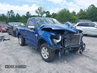 2023 Ford F-150 XL with VIN 1FTMF1C57PKD05328, listed as a IAAI auction lot 42333897 with 32,382 mi miles and . Bid and sale history available at DreamBid. Image 1.