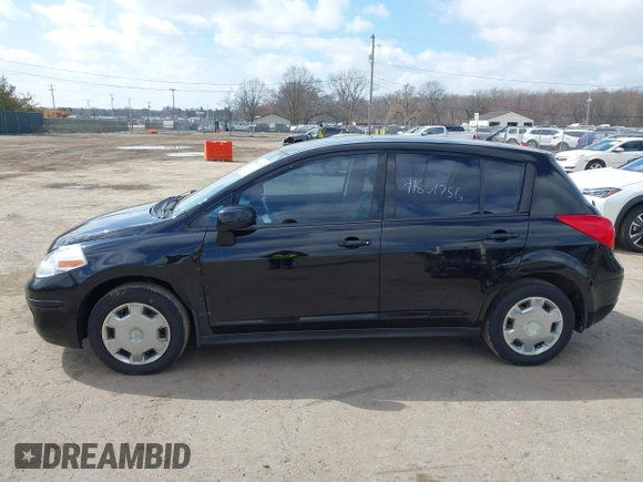2012 Nissan Versa S with VIN 3N1BC1CP9CK290446, listed as a IAAI auction lot 41861756 with 124,883 mi miles. Bid and sale history available at carsss.com. Image 14.
