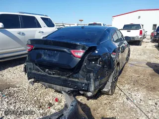 2021 Nissan Maxima SV with VIN 1N4AA6CV9MC506223, listed as a IAAI auction lot 41702758 with 88,345 mi miles. Bid and sale history available at carsss.com. Image 4.