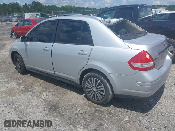 2011 Nissan Versa S with VIN 3N1BC1AP4BL446596, listed as a IAAI auction lot 42425302 with 141,047 mi miles and . Bid and sale history available at DreamBid. Image 3.