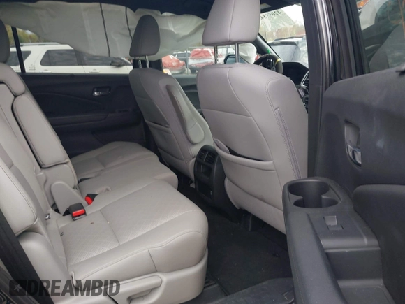 2019 Honda Passport EX-L with VIN 5FNYF8H5XKB024116, listed as a IAAI auction lot 42055543 with 68,641 mi miles and . Bid and sale history available at DreamBid. Image 8.
