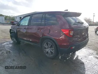 2021 Honda Passport EX-L with VIN 5FNYF7H55MB015305, listed as a IAAI auction lot 41672601 with 74,788 mi miles. Bid and sale history available at carsss.com. Image 3.