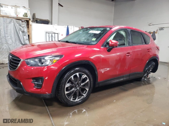 2016 Mazda CX-5 Grand Touring with VIN JM3KE4DY7G0703730, listed as a Copart auction lot 45937475 with 58,748 mi miles and Salvage Title. Bid and sale history available at carsss.com. Image 1.