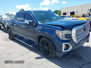 2021 GMC Sierra 1500 Denali z VIN 3GTU9FELXMG387235, wystawiony jako IAAI lot #42580101 z przebiegiem 43 463 mil mil oraz . Historia ofert i sprzedaży dostępna na DreamBid. Obrazek 1.
