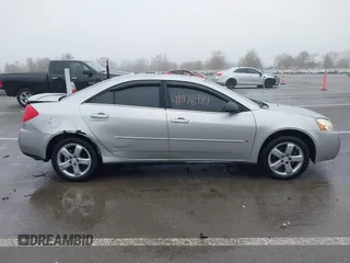 2006 Pontiac G6 GT with VIN 1G2ZH558764108360, listed as a IAAI auction lot 41976489 with Not provided miles and . Bid and sale history available at DreamBid. Image 13.