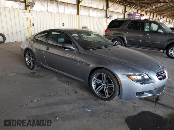 2006 BMW M6 with VIN WBSEH934X6B797428, listed as a Copart auction lot 63462135 with 73,393 mi miles and Salvage title. Bid and sale history available at DreamBid. Image 4.