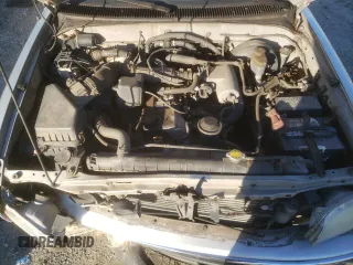 2004 Toyota Tacoma z VIN 5TEVL52N74Z390717, wystawiony jako Copart lot #45209015 z przebiegiem 187 005 mil mil oraz Szkoda całkowita • Salvage title. Historia ofert i sprzedaży dostępna na DreamBid. Obrazek 11.