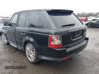 2011 Land Rover Range Rover Sport HSE LUX with VIN SALSK2D42BA294809, listed as a IAAI auction lot 41872656 with 220,795 mi miles. Bid and sale history available at carsss.com. Image 3.
