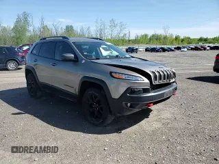 2017 Jeep Cherokee Trailhawk L Plus z VIN 1C4PJMBB4HW593615, wystawiony jako Copart lot #56342885 z przebiegiem 88 215 mil mil oraz Szkoda całkowita • Salvage title. Historia ofert i sprzedaży dostępna na DreamBid. Obrazek 14.