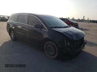 2013 Honda Odyssey EX-L with VIN 5FNRL5H66DB023651, listed as a Copart auction lot 48676274 with 164,687 mi miles and Salvage Title. Bid and sale history available at DreamBid. Image 4.