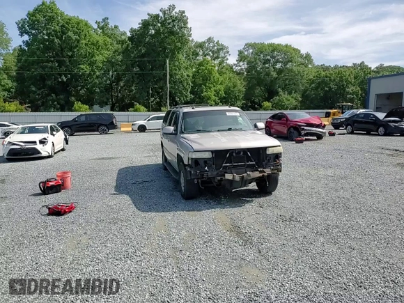 2004 Chevrolet Suburban LT z VIN 1GNEC16Z34J242670, wystawiony jako Copart lot #60987725 z przebiegiem 277 961 mil mil oraz Szkoda całkowita • Salvage title. Historia ofert i sprzedaży dostępna na DreamBid. Obrazek 15.
