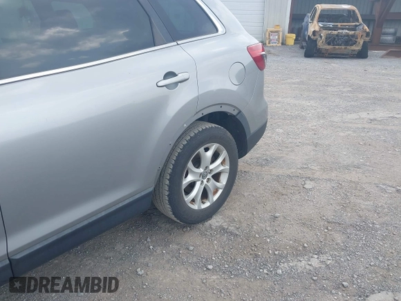 2013 Mazda CX-9 Sport with VIN JM3TB3BA2D0407491, listed as a IAAI auction lot 42430839 with 162,827 mi miles and . Bid and sale history available at DreamBid. Image 6.