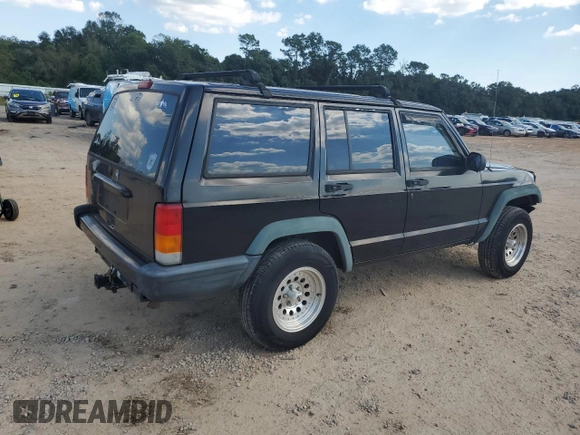 1997 Jeep Cherokee SE with VIN 1J4FJ28S6VL563756, listed as a Copart auction lot 74795074 with 196,118 mi miles and Salvage Title. Bid and sale history available at carsss.com. Image 3.