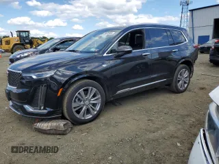 2023 Cadillac XT6 AWD Premium Luxury with VIN 1GYKPDRS2PZ136677, listed as a Copart auction lot 58072604 with 10,042 mi miles and Salvage Title. Bid and sale history available at carsss.com. Image 1.