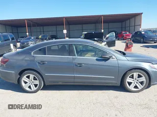 2013 Volkswagen CC Sport with VIN WVWBN7AN0DE551132, listed as a IAAI auction lot 41849514 with 144,557 mi miles. Bid and sale history available at carsss.com. Image 13.