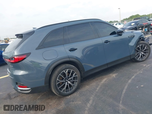 2025 Mazda CX-70 Premium Plus with VIN JM3KJEHA3S1126454, listed as a IAAI auction lot 42427454 with 5,648 mi miles and . Bid and sale history available at DreamBid. Image 4.