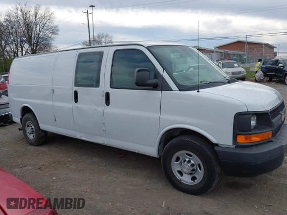 2014 Chevrolet Express Cargo Van with VIN 1GCWGGCA4E1209164, listed as a IAAI auction lot 41838141 with 174,770 mi miles. Bid and sale history available at carsss.com. Image 6.