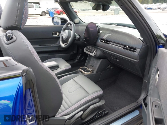 2025 MINI Convertible with VIN WMW23GX01S2X08664, listed as a IAAI auction lot 42506008 with 1,641 mi miles and . Bid and sale history available at DreamBid. Image 5.