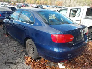 2013 Volkswagen Jetta Sedan SE with VIN 3VWDP7AJ8DM395980, listed as a IAAI auction lot 41013666 with 142,537 mi miles. Bid and sale history available at carsss.com. Image 3.