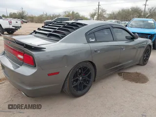 2012 Dodge Charger SXT with VIN 2C3CDXHG8CH244592, listed as a IAAI auction lot 41548991 with 116,855 mi miles. Bid and sale history available at carsss.com. Image 4.